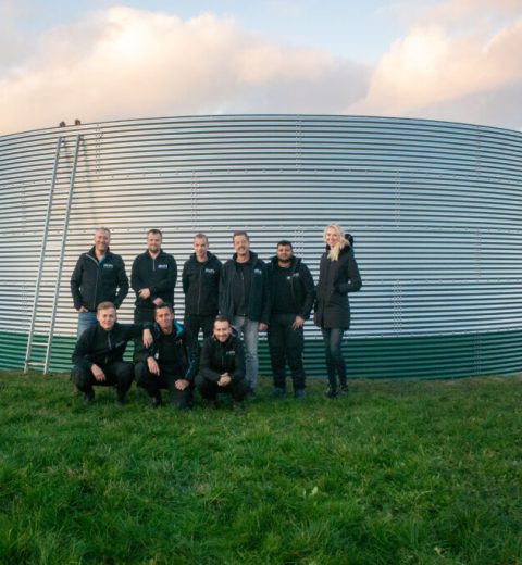 Installing a water tank at a local Christmas tree nursery, the Netherlands